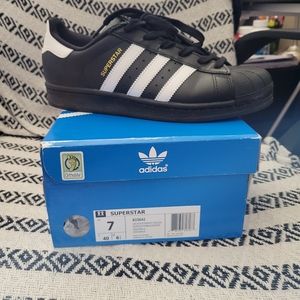 Adidas Superstars with gold